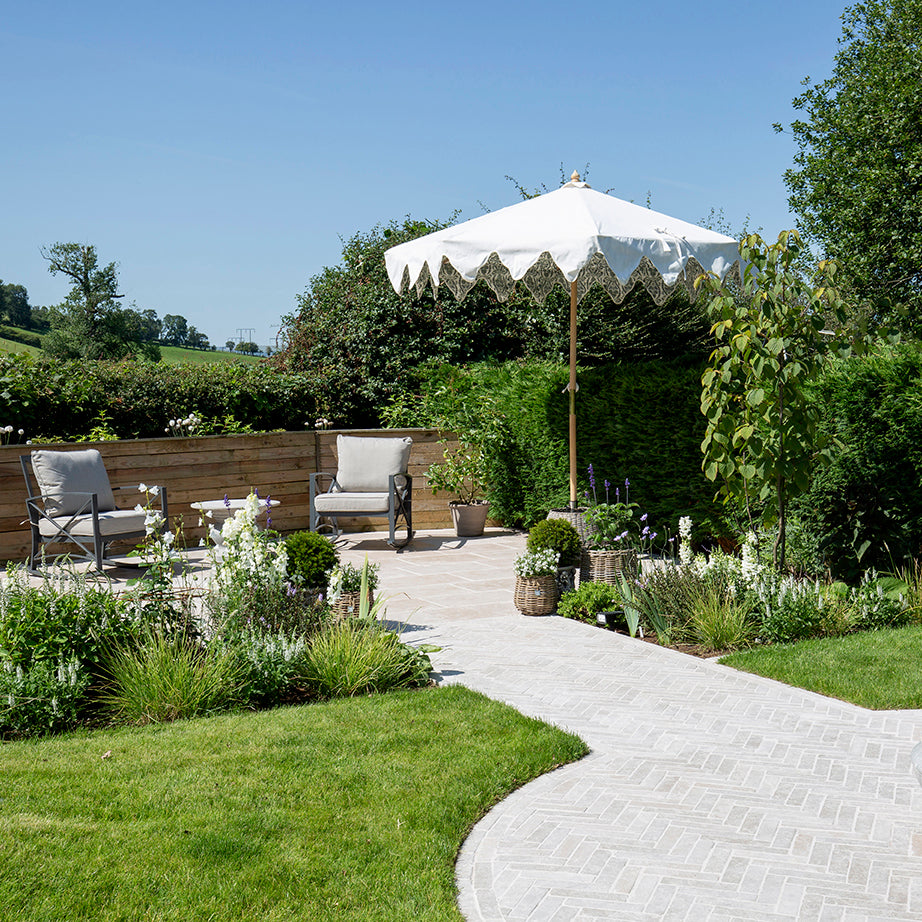 Step Inside a Country Garden with Dijon Herringbone Tiles